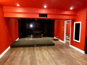 See Riser for Seating as We Look to Back of Home Theater Room