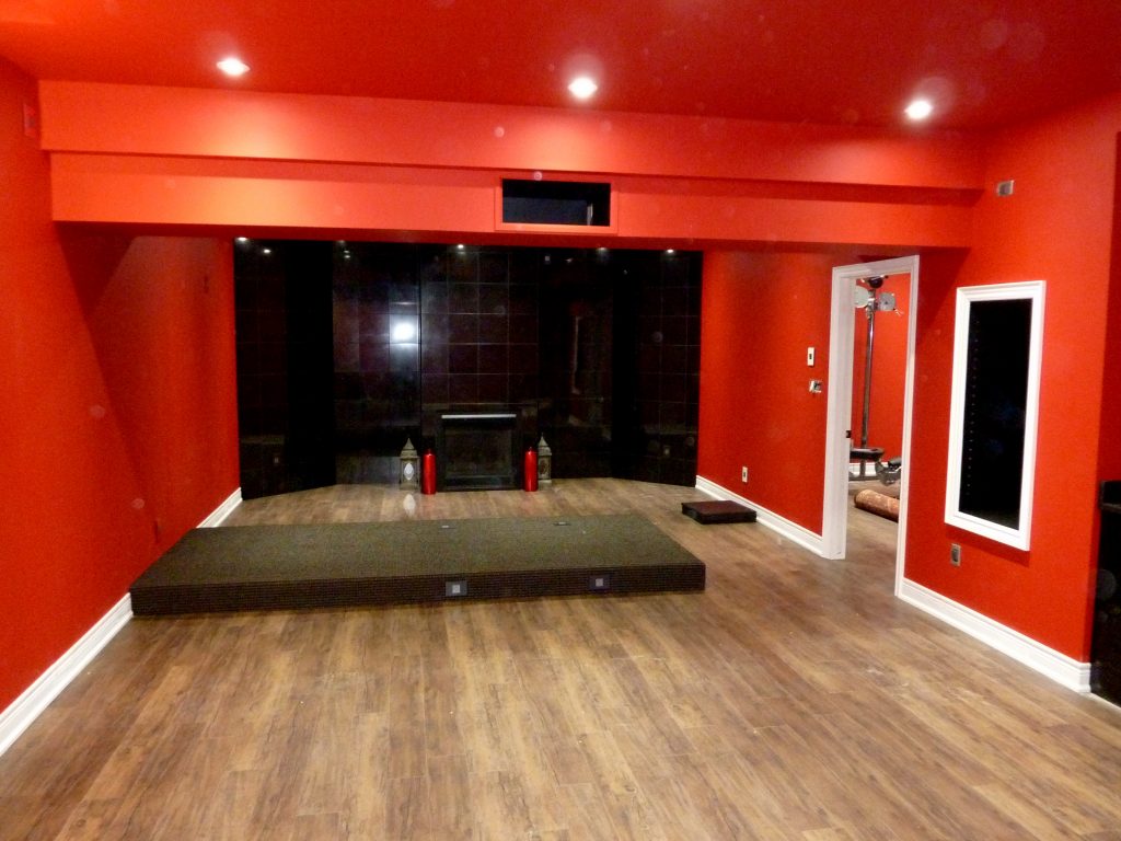 See Riser for Seating as We Look to Back of Home Theater Room