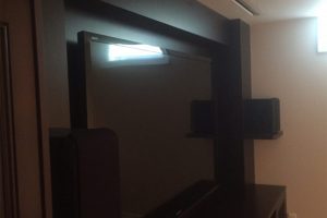 4. Projection Screen Drops Down in Front of TV