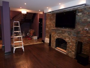 TV Over Fireplace with Drop Down Screen Above