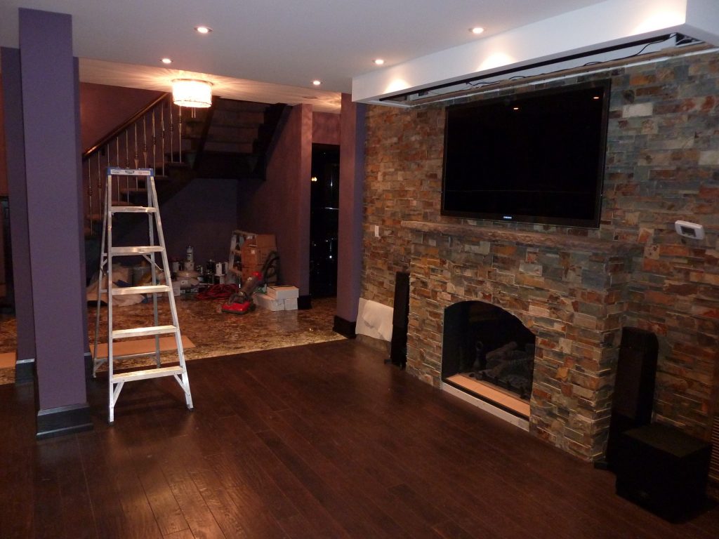 TV Over Fireplace with Drop Down Screen Above