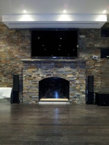 TV Over Fireplace with Drop Down Screen Above