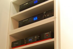 Custom Home Audio Shelving in Condo closet