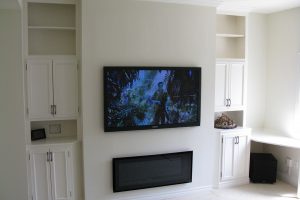 Clean TV Installation with Sub Woofer in Corner